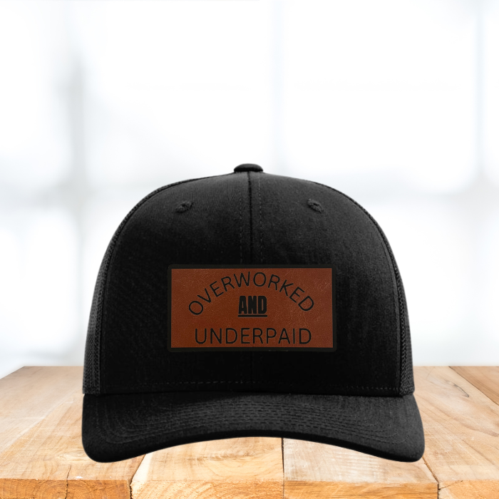 'Overworked & Underpaid' Hat - Funny Leather Patch Trucker Cap for the Tired & Underappreciated - Build Your Hat